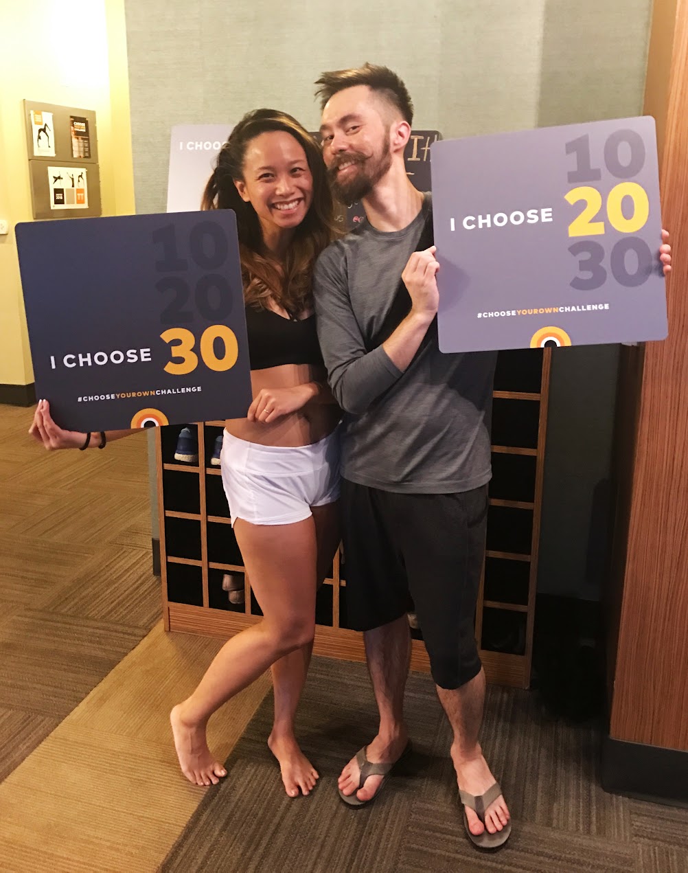 "andrew willeford and his wife at a yoga studio"